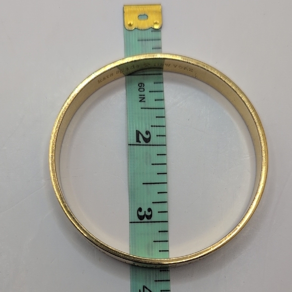 Kate Spade Gold Cuff Bracelet with Textured Finish and Engraving - Picture 7 of 7